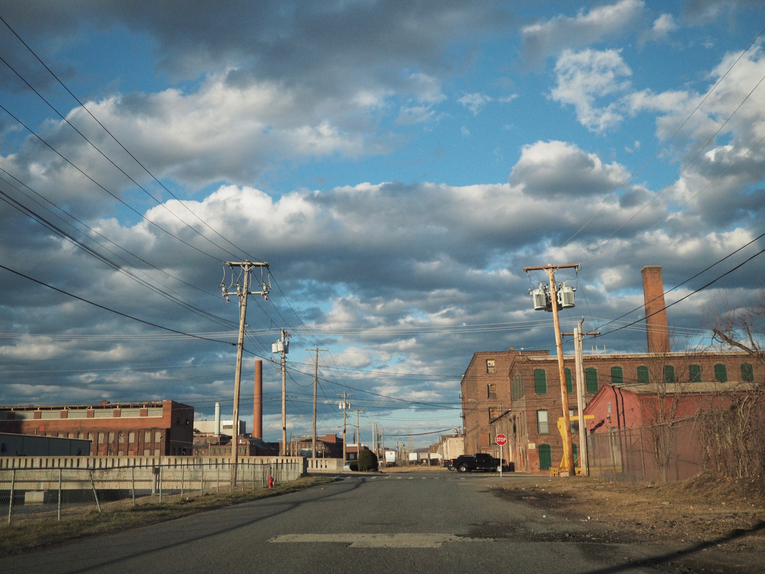 Clouds and wires over Holyoke — copyright Trace Meek